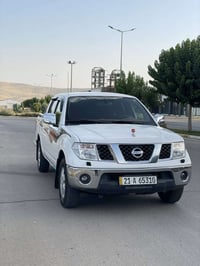 نيسان نافارا • ٢٠١١ • دهان جزئي