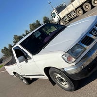 نيسان • ٢٠٠٥ • ٤ أبواب