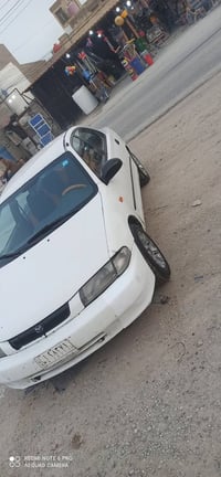 مازدا 323 • ١٩٩٨ • رقم كربلاء