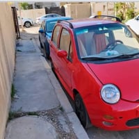 للبيع سيارة كيو كيو موديل ٢٠١٢ شيري صالون رقم انكليزي بغداد السعر ٢٥ور...