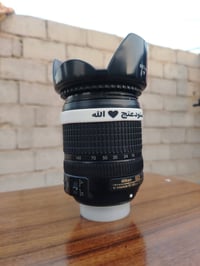عدسة نيكون18-140 نضافه 90% سعرها 180 تواصل خاص اتصال07813059665