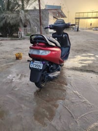 فراشة • ما مفتوحة • موتوسيكل