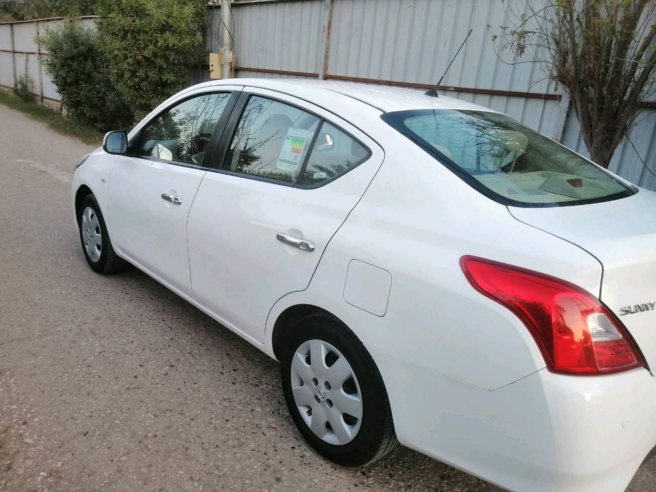 نيسان صني هندي موديل 23 قطعتين صبغ فقط ولباقي كفاله ماشيه 136كير محرك مكفول تبريد ثلج موقع بغداد محموديه 