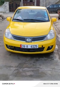 ياالله نيسان فيرسا 2009محرك 18اوتو AT مرغوب  هزه جديده يوم 25سويته شهر...