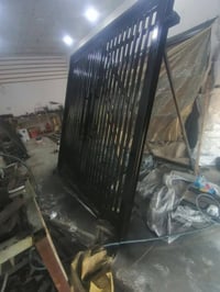 باب ٢م×٢م • حديد ثقيل ٢مم • صبغ مرحلتين