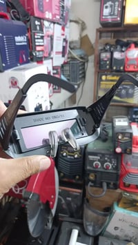 نظارة لحام • تعتيم ذاتي • شحن ذاتي