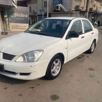 لانسر خليجي وارد يابان موديل ٢٠٠٩ السيارة جديدة بدون صبغ بدون ضربة فقط...