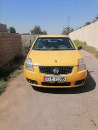 نيسان سنترا للبيع موديل 2010 رقم بغداد انكليزي السعر 38 وبيها مجال للش...
