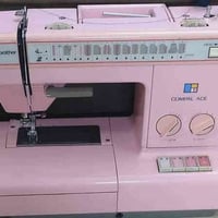 مكينة خياطة • برذر ياباني • شقق الخضراء