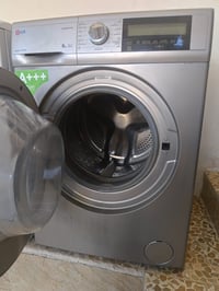 غسالة أوتوماتيك • غسالة ملابس