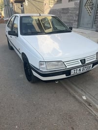 بيجو 405 • رقم بغداد • مكفوله