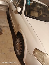 نيسان سني بدي كوري موديل 2009بغداد بااسمي سياره جديده ماشيه 91الف استع...