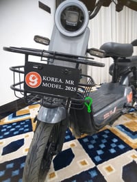 دراجه شحن للبيع جديده وكيل صار شهر من مشتريه .السعر 350 بيه مجال...077...