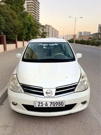 نیسان تیدا 2009  1 پارچە و نیوی بۆیاخە کەمێک وردەی هەیە  گێڕ و مەکینەی...