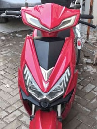 دراجه شحن بصمه تشغيل عن بعد جهاز انذار من للسرقه و مثبت سرعه  نضيفه كا...