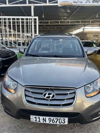 سنتافيا2011بدون حادث فقط صبغ وبيه سونار سعره115.  /07881681956