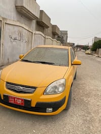 عندي كيه ريو موديل 2009 رقم انكليزي  سياره نضيفه ماعوزه شي ستر الله طخ...