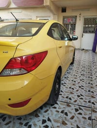 اكسنت خليجي موديل ١٥ بسمي رقم بغداد انكليزي سنويه وهزه جديده مصفره هيئ...