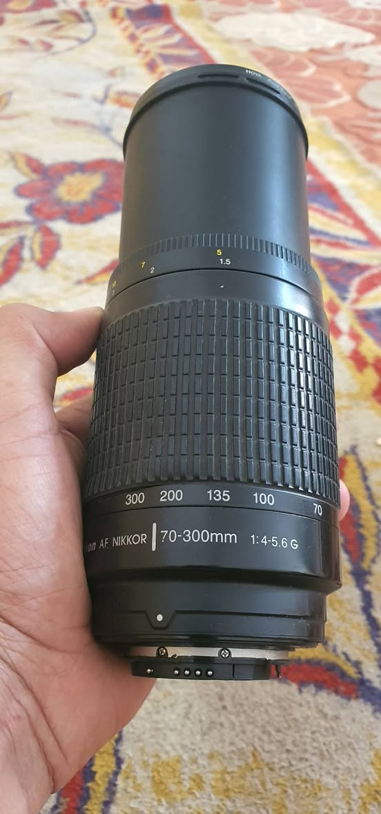 سلام عليكم زوم رياضي نيكون 70 300 فول نظافه جديد معه فلتر مكاني نجف يوجد توصيل جميع المحافظات العراق *********** Iran
