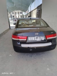 سوناتا 2008  وارد امريكي  ضررها چاملغ المامي والخلفي  الاتصال(07726268...