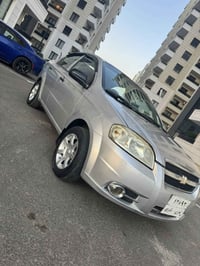 افيو 2009 صبغ باب  سكن جاملوغ خلفي بدون دواخل سعر 55 مجال 07512062559