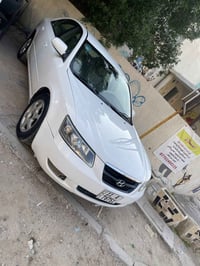 سوناتا ٢٠٠٦ رقم بغداد الجديد و هزه جديده محرك v6/3300 ابيض صدفي لا صبغ...