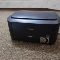 طابعة كانون ٦٠٣٠ • شغالة ونضيفة • بغداد