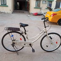 بايسكل • مع أغراض • العمارات