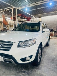 سنتافي موديل 2012خليجي رقم بغداد الجديد باسمي صبغ باب خلفي السعر157مكي...