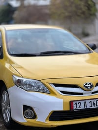 للبيع كورلا بيكاجو   موديل 2009 محدث 12  كوبون بانزين  هزه جديده  سنوي...