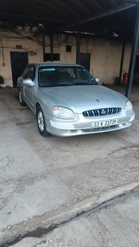 سوناتا 2001 مكينه گير تخم تاير كهربائيات كله جديد  صدر خلفي امامي جديد...