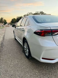 سياره كورلا  موديل 2023 شركة ساز  سياره فول 1/1 مواصفات فتحه و بصمه و ...