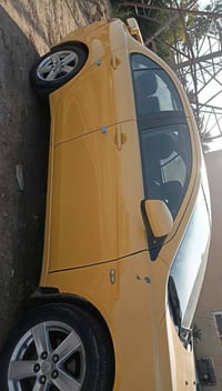 لانسر قرش • مصفره • حادث خلفي