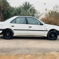 بيجو روى 2009  رقم بغداد   السياره مكفوله كفاله عامه  تدفئه تبريد شغال...