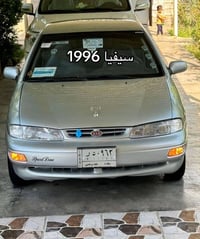 سيفيا 1996لون سلفر اوتاماتيك  رقم بغداد مشروع وطني   باقي التفاصيل وات...