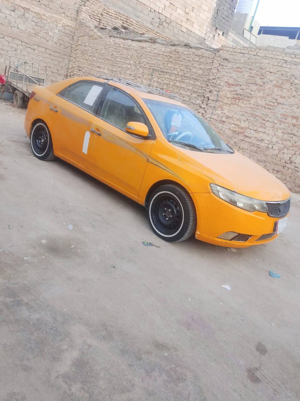 كيه سيراتو موديل 9 خليجي تنته كير مكينه كله مكفول تخم تاير ابو خط تبريد شغال بدي مكفول من ضربه مصفره هيئه وغرامات السعر 75 للاتصال على *********** العنوان بصره جمهوريه
