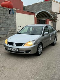 لانسر 2010   رقم ديالى الدولي تحويل ثاني يوم سنوية لل 29  بيهة صبغ قطع...