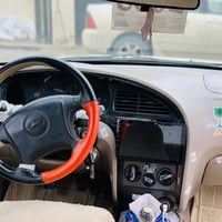 هوندا تكسي • ٢٠٠٢ • أصفر