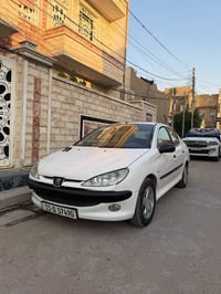 بيجو ٢٠٦ • ٢٠٠٩ • رقم بغداد