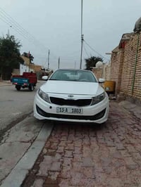 لبيع كيا اوبتيما2011 كفاله عامه. فول بنرامه. من ضربه ولفتح وتبديل سيار...