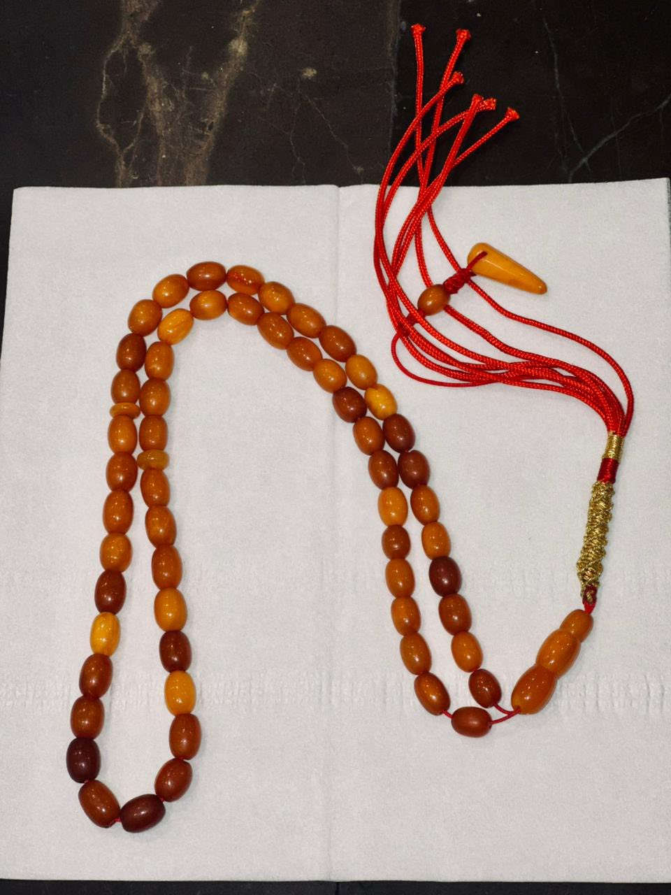 كهرب الماني حجري حر اصل عقود ٢٢ غرام ٥٧ حبة للاستفسار ***********
