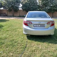 عندي تويوتا كامري خليجي سلفر موديل 2014 رقم سليمانية  بيه قطع صبغ  الس...