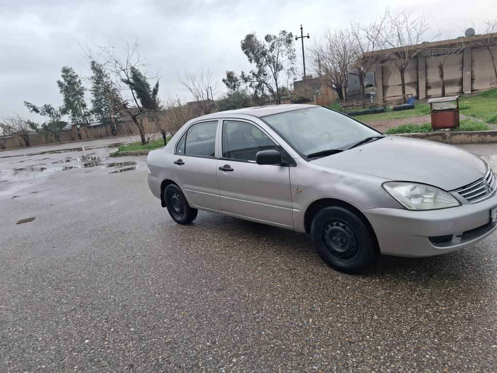 لانسە ر مودیل 2010 مە کینە بچوك  یە ك پارچە ی بۆیاخە مە کینە و گیڕی بە شە رت هیچ مە سروفی تیانیە سە نە وی نویکراوە تە وە   تاساڵی 2030  بە سە ر ناچیت خۆمان خاوە ن سە نە وین  وە کالە ش  دە کە ین   سعر   69  وە رە قە  کە میك معامە لە شی تیایە  ژمارە تە لە فۆن *********** كويسينجاك, أربيل
