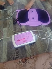 تدليك أقدام • نبضات كهربائية • حرارة