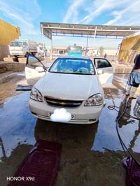 اوبترا موديل 2009 صبغ ربع الجنطه جوه الرقم الخلفي فقط گير و محرك شديته...