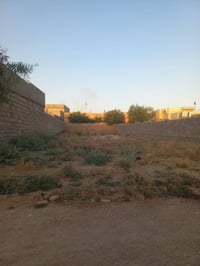 أرض زراعي • ٤٠٠م • شارع مطار