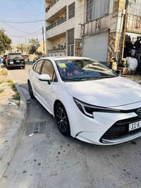 ورحمه الله وبركاته تويوتا كورلا   هايبرد شكل امريكي 2025 كفالة عامه سي...