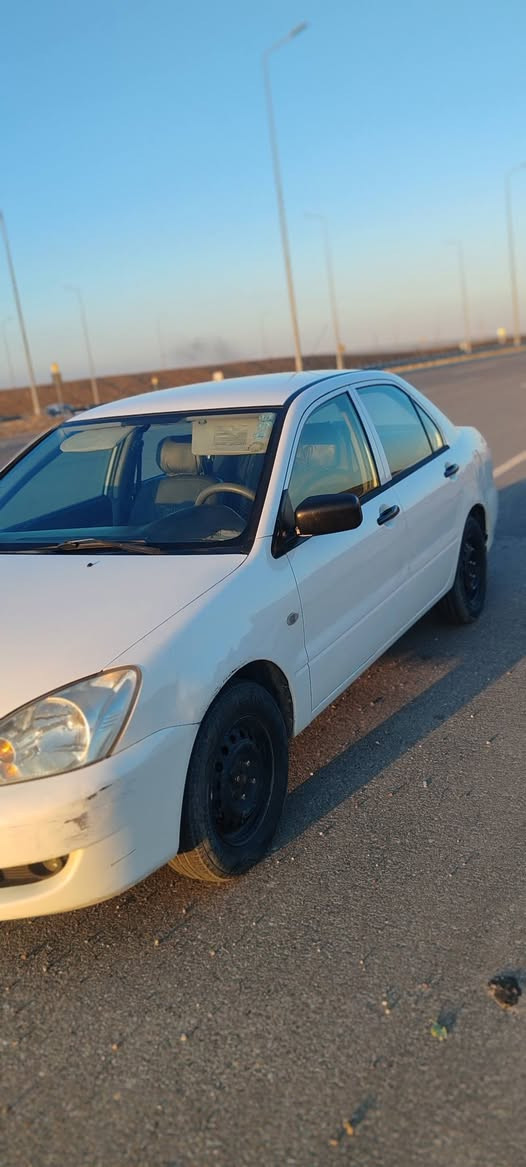 لانسه ر 2010 مه كينه گه وره ى گيرتۆماتیک ئاوينه كاره بايى
 گير و مه كينه و ته قه و ره قه و ته بريد و گه رمى هه مووى شتيكى به شه رت. 
پيش و پشت كه پس

چاملخى پشته وه ى بؤياخه
سه نه وى نوێیە
يه ك دينار مه سره فى تيدانييه
***********
*********** أربيل, العراق
