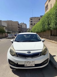 كيا ريو موديل 2013 خليجي رقم اربيل ماشية 190 الف تحويل مباشر  او وكالة...