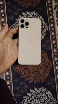 ايفون ١٢ برو ماكس خطين مبدل شاشة وبطارية وكالة والشاشةبيهة نقطعة خف كل...